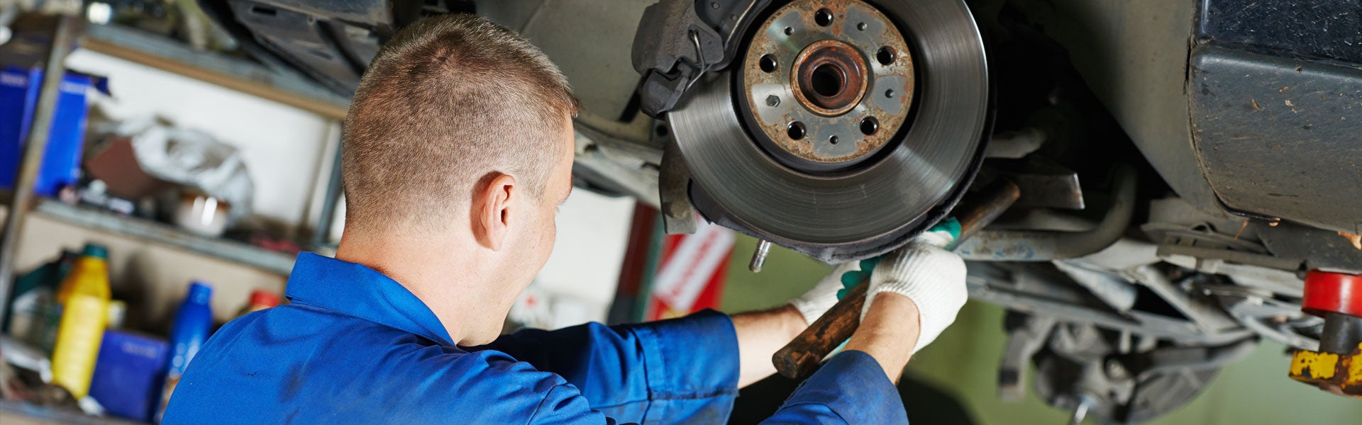 Service worker fixing a tire